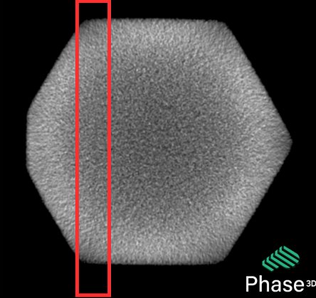 CT scan of the same part, with porosity visible in the boxed region.